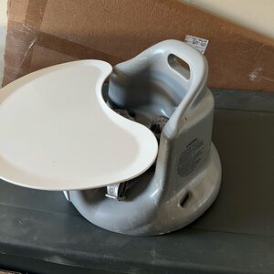 Upseat gray floor seat with tray